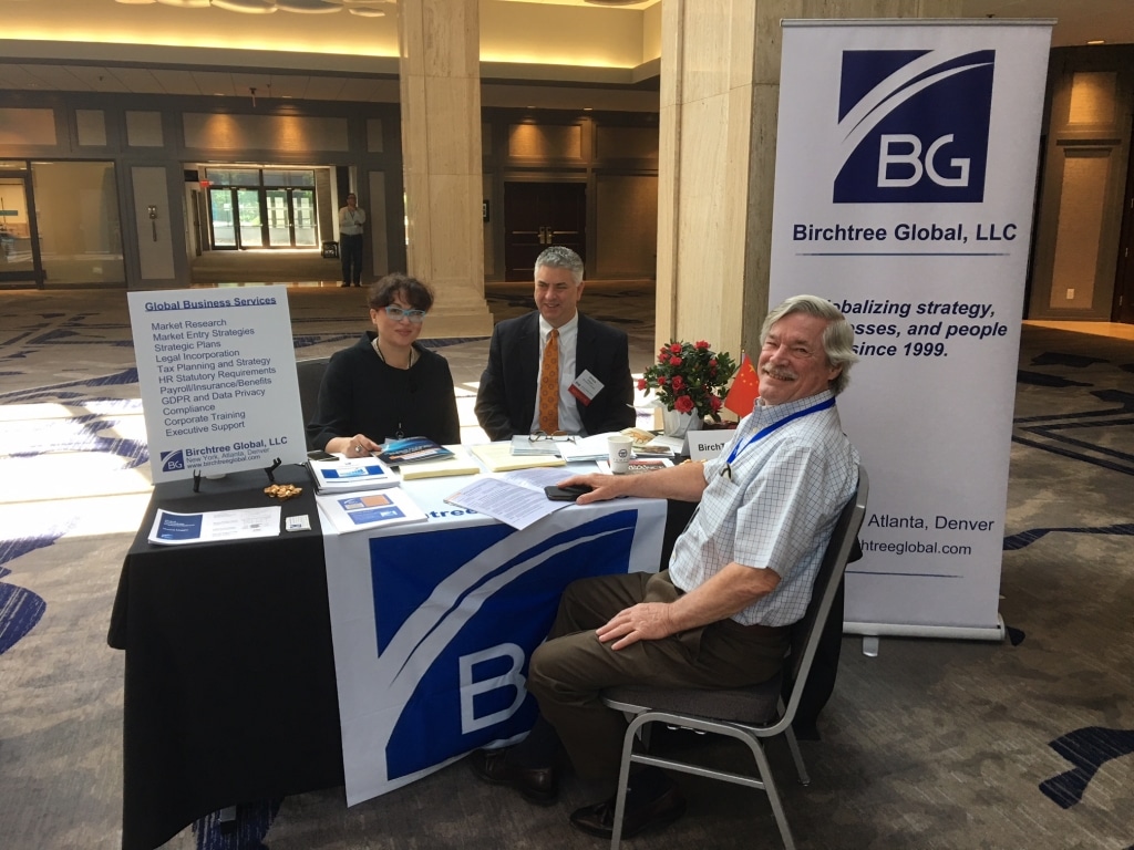 Atlanta staff birchtree Rick Gimbert sitting at table with Atlanta staff